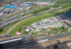 Luchtfoto van het braakliggende terrein langs de A15 bij Alblasserdam